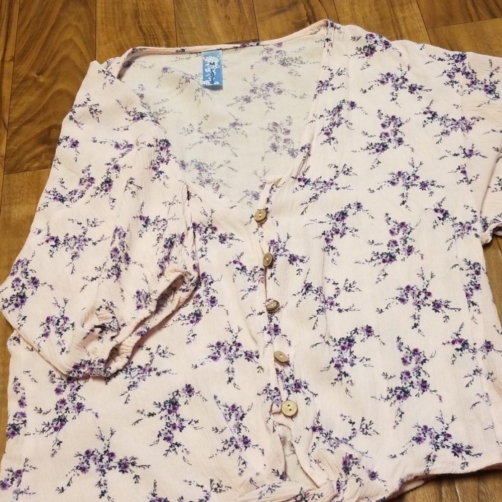 Light pink floral button down tie front blouse